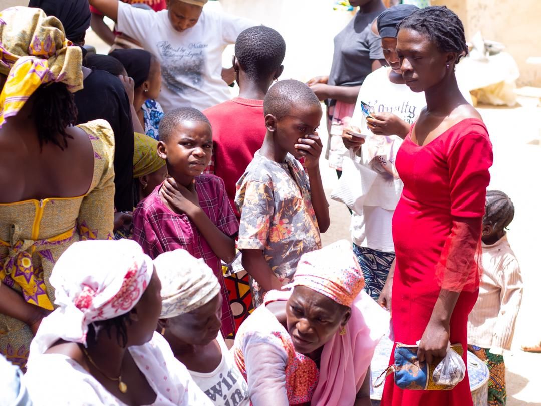 Women and children gathered at a Wellness 360 community outreach
