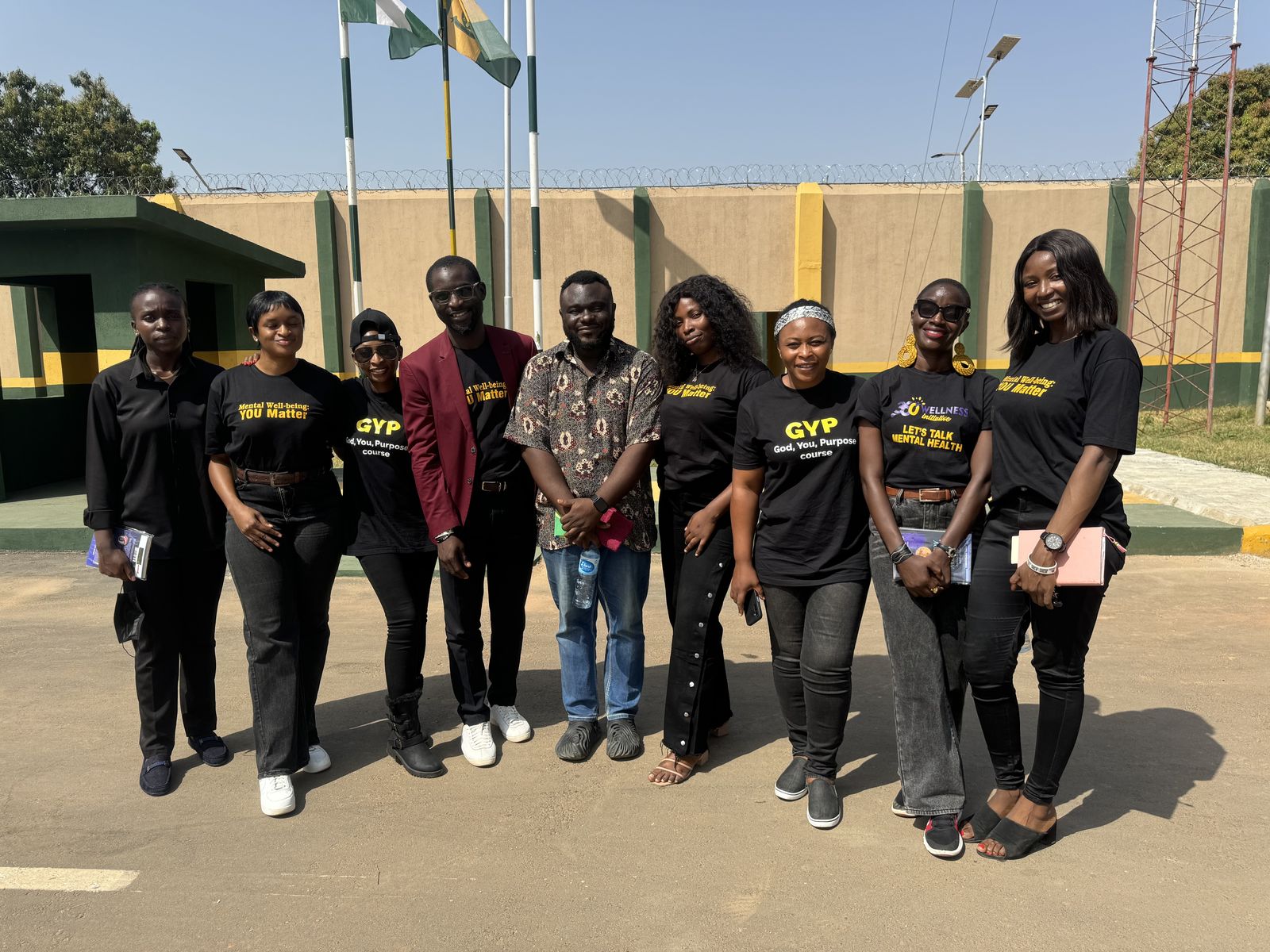 The Wellness 360 Initiative team standing together in branded shirts